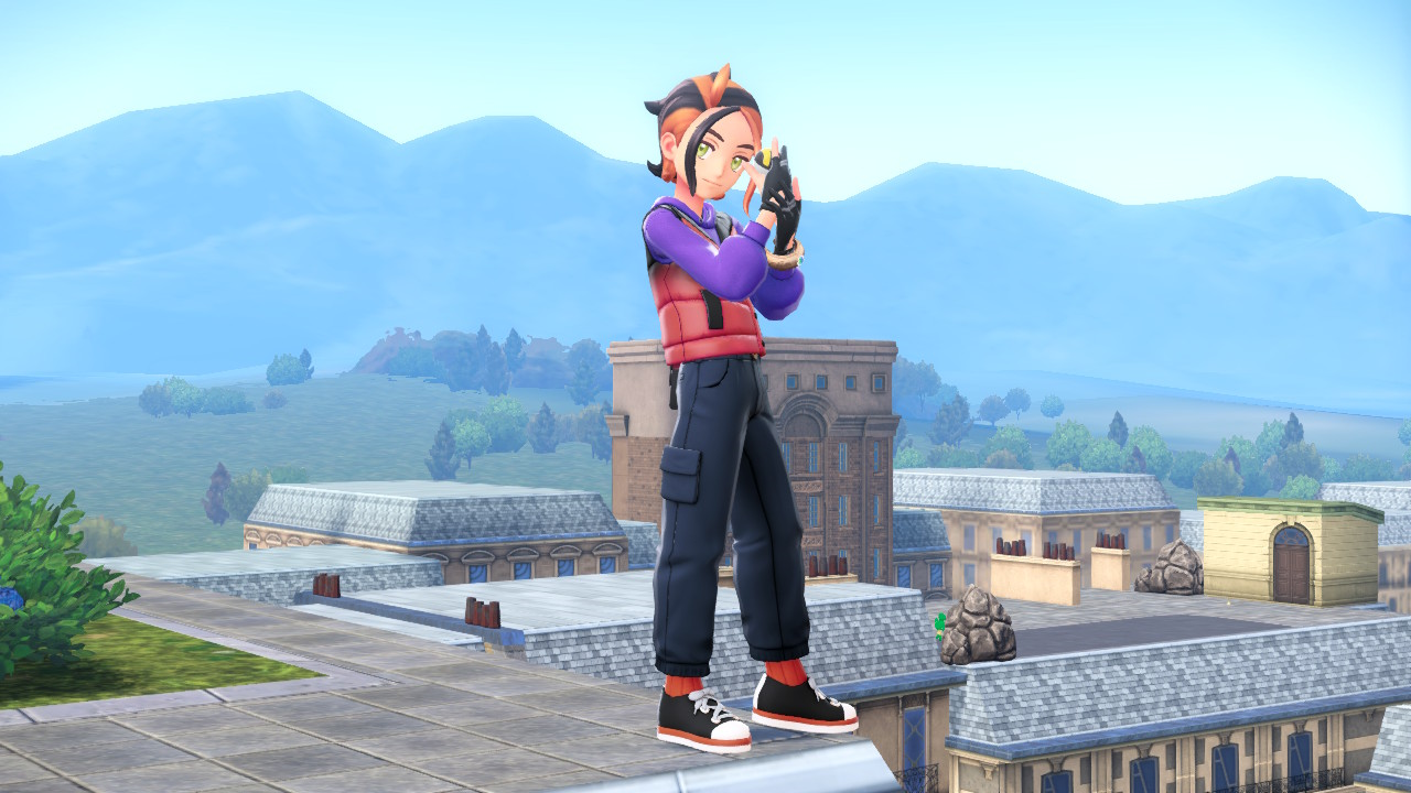 A screenshot of my OC Ledger standing on top of a roof at about a 3/4 angle to the camera. He's wearing a purple coat with a puffer vest over it. The vest is black at the top, but transitions to an orangish red at the bottom. He has hair pulled back which consists of alternating wide strands of orange and black, plus two tufts hanging down from the front middle. The left tuft is black and the right is orange. He has bright green eyes. For his bottom, he's wearing dark blue cargo pants, orange socks, and black and white skate shoes. His pose looks confident, with him holding his right hand up near the side of his head.